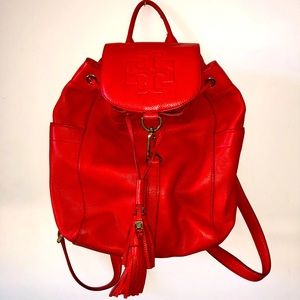 Tory Burch red backpack that is a vibrant addition to any outfit!